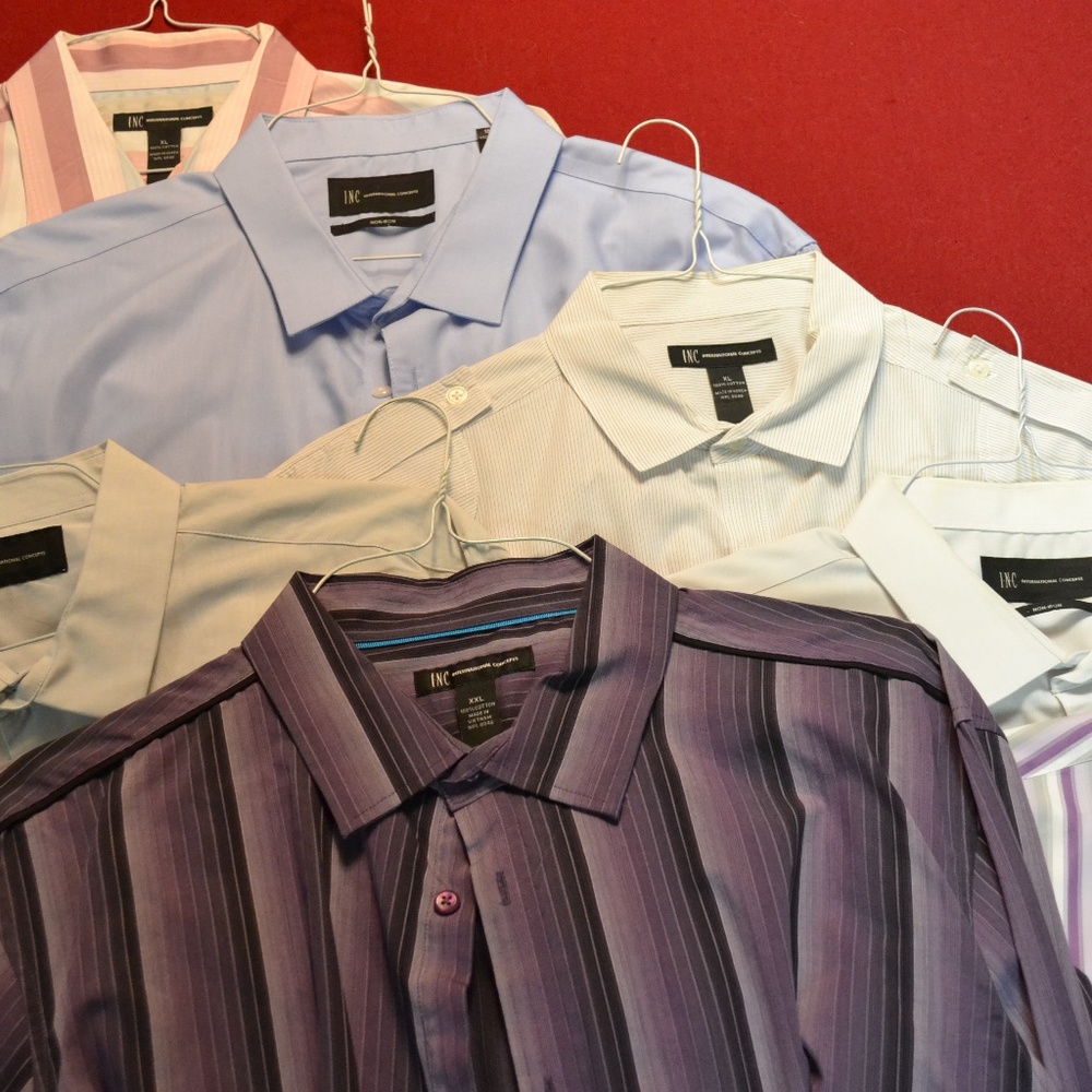 Bundle of eight Men's long sleeve dress shirts.